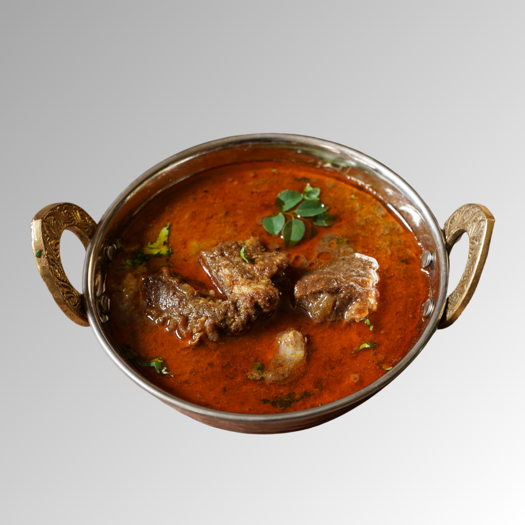 Chef's Special Goat Curry - Raja's Indian Restaurant & Bar